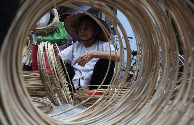 One of the processes in making a conical hat